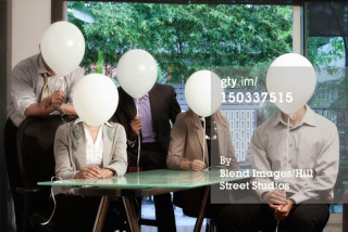 Illustration for article titled The 19 Worst 'Business Teamwork' Stock Photos
